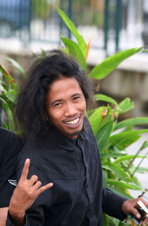 Indonesia, Bali 22 February 2008: Portrait young men in Kuta 22 February 2008 on Bali. Indonesiaのeditorial素材