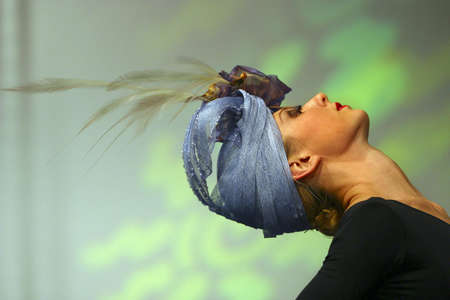 MOSCOW. RUSSIA. MARCH 28th, 2006: Display of clothes from known Russian fashion designers. Model on a podium representing clothes. March 28th, 2006, Moscow. Russia.のeditorial素材