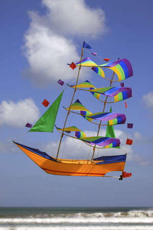 Fly a kite - a sailing vessel in the skyの写真素材