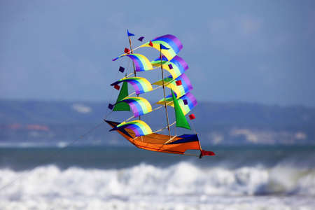 Fly a kite - a sailing vessel in the skyの写真素材