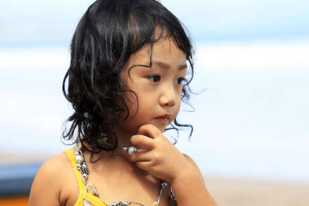 Portrait of the beautiful small Asian girl.  Indonesia. Javaの写真素材