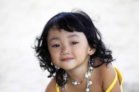 Portrait of the beautiful small Asian girl.  Indonesia. Javaの写真素材