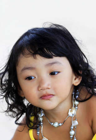 Portrait of the beautiful small Asian girl.  Indonesia. Javaの写真素材