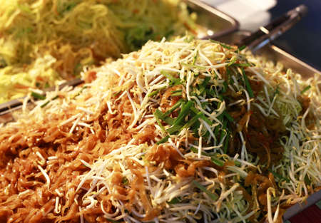 The chicken with rice noodles with fork close upの写真素材