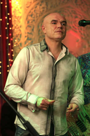 MOSCOW - DEC 25 : Russian singer and musician Sergey Mazaev (L) and musician Sergey Mazaev (R), from the group のeditorial素材