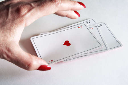 close up of playing cards poker game on white backgroundの写真素材