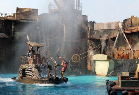 HOLLYWOOD - SEPTEMBER 17: Stuntman is in action in the live stunt show called Waterworld on 17 September in 2011 in the Universal Studios Hollywood.のeditorial素材