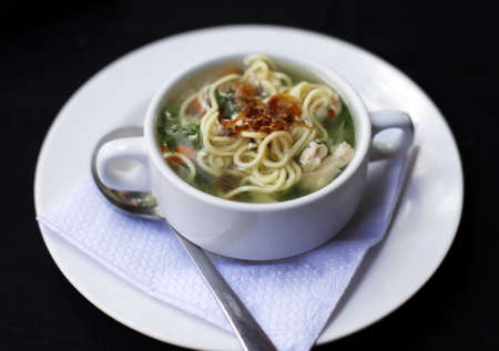 Popular comfort food of chicken noodle soup a favorite in Indonesiaの写真素材