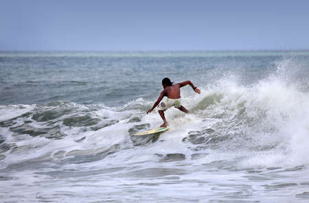 Man-surfer in ocean  Bali  Indonesia