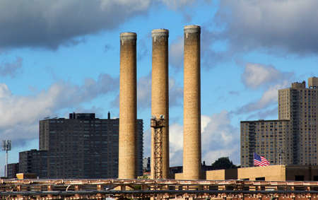 Old factory seen from ferry outside of Manhattan, New York City, New York.のeditorial素材