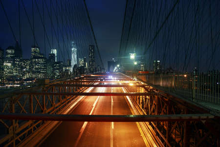 Brooklyn Bridge and Manhattan Skyline At Night, New York Cityの写真素材
