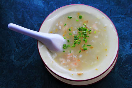 Fish cream soup on a dark blue backgroundの写真素材