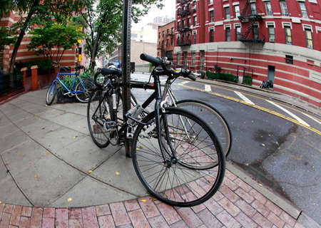 Bicycles parked in the street New Yorkのeditorial素材