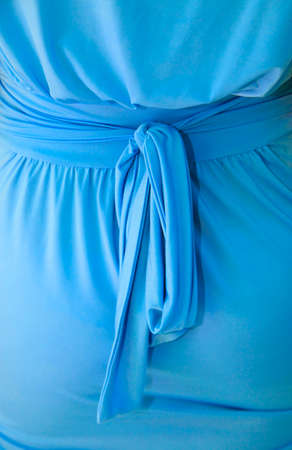 female blue dress with bowの写真素材
