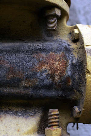 The full screen a high shot of the decision of an old pipe. Good for structure or a background.