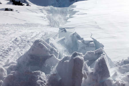The heap of snow formed from movement of a special equipment in mountains