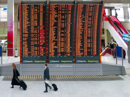 Paris, France - September 16, 2010: Flight announcement shows time of departure on a screen, airport Charles de Gaulle in Paris, Franceのeditorial素材