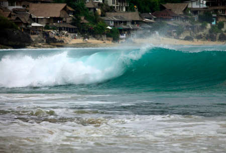 Big wave crashes on to the shore. Place Dreamland. Bali