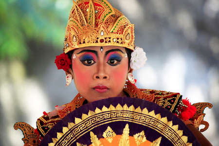 Bali, Indonesia - July 04, 2010: Portrait of dancing boy, ages 10 years old, in national clothes. Traditional daily representation in safari - park to Bali 4 July 2010, Indonesiaのeditorial素材