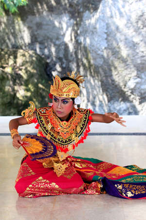 Bali, Indonesia - July 04, 2010: Portrait of dancing boy, ages 10 years old, in national clothes. Traditional daily representation in safari - park to Bali 4 July 2010, Indonesiaのeditorial素材