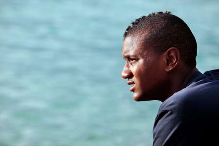 Pereybere Mauritius January 22 2012: Unknown fisherman Creole posing in front of their boat on...