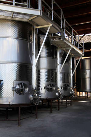 Modern aluminum barrels where grape juice is aged into wineの写真素材