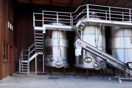 Modern aluminum barrels where grape juice is aged into wineのeditorial素材