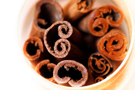 Cinnamon close-up isolated on white backgroundの写真素材