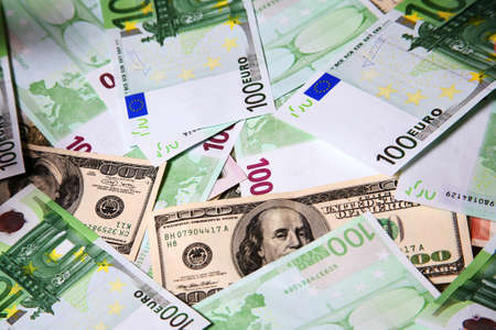 100 Euros and 100 Dollars money stackの写真素材