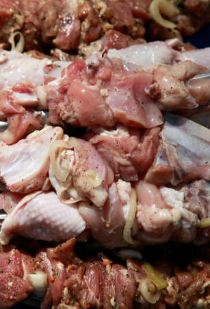 The image of fried meat on skewersの写真素材