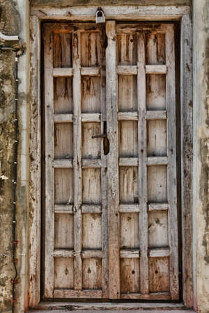 Old wooden door at Stone Town the capital of Zanzibar island East Africa.の写真素材