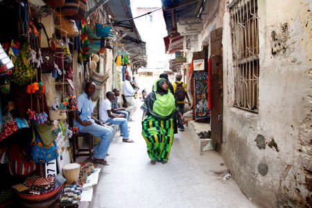 Stone Town, Zanzibar, Tanzania - December 30, 2015: People going about their daily business in Stone Town market, on the island of Zanzibarのeditorial素材