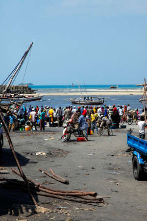 Stone Town, Tanzania - December 30, 2015: Fish market. Streets of the town are always lively. There is alwais a lot of local people and tourists. On the fish market the smell is so strong that you can not stand in there for a long time. Fish market in Stoのeditorial素材