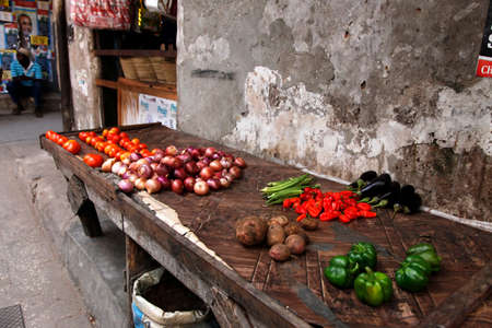 Stone Town, Tanzania - January 1, 2016: Sellers offer fruit and vegetables in the city market in Stone Town, on Zanzibar island.のeditorial素材