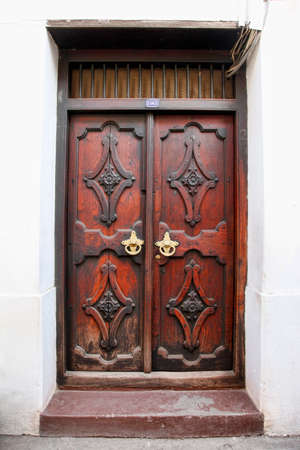 Old wooden door at Stone Town the capital of Zanzibar island East Africa. Zanzibarの写真素材