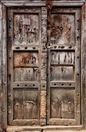 Old wooden door at Stone Town the capital of Zanzibar island East Africa. Zanzibarの写真素材