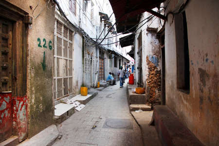 Stone Town, Zanzibar, Tanzania - January 1, 2016: People going about their daily business in Stone Town market, on the island of Zanzibarのeditorial素材