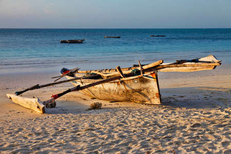 Dhow in the water ready to sail off the coast of Zanzibarの写真素材
