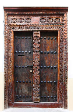 Old wooden door at Stone Town the capital of Zanzibar island East Africa.の写真素材