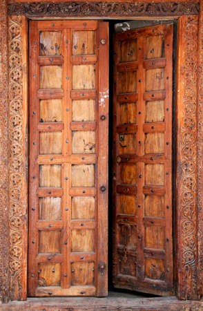 Old wooden door at Stone Town the capital of Zanzibar island East Africa. Zanzibarの写真素材