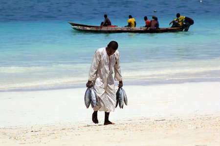 Zanzibar, Tanzania - January 7, 2016: Traditional fish market on the beach in Nungwi. Zanzibarのeditorial素材