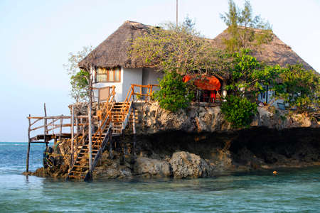 Zanzibar, Tanzania - January 8, 2016: Small restaurant on top of the rock (The Rock). It is located south east of the island, on the Michamwi Pingwe peninsula. Zanzibar, Tanzaniaのeditorial素材