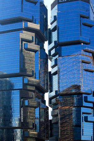 Hong Kong, Hong Kong SAR - December 29, 2014: twin-tower skyscraper complex completed in 1988 at 89 Queensway, in Admiralty on Hong Kong Island in Hong Kong, China. Tower I is 172 m 564.3 ft with 44 storeys, and Tower II is 186 m 610.2 ft with 48 storeys.のeditorial素材
