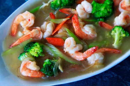 Prawn in sauce with a vegetablesの写真素材