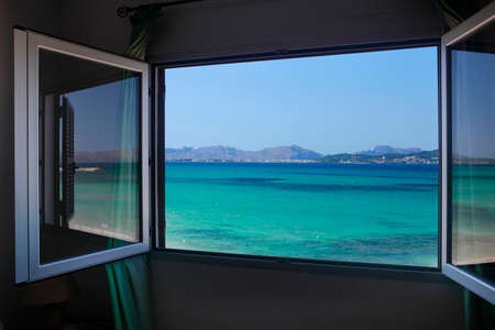 The open window, with sea viewsの写真素材