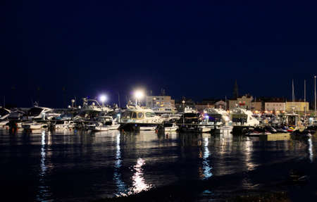 Tall luxury boats and yachts moored in port in Budva. Montenegroの写真素材