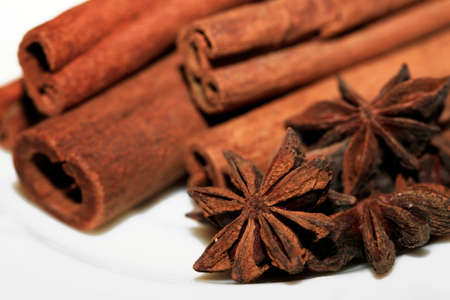 anice and cinnamon isolated on white backgroundの写真素材