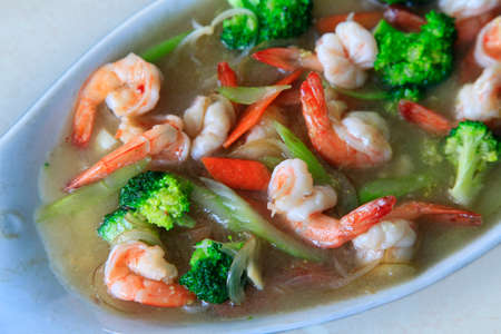 Prawn in sauce with a vegetablesの写真素材