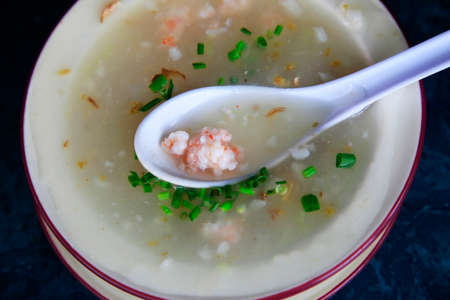Fish cream soup on a dark blue backgroundの写真素材
