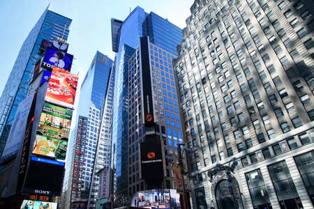 New York, NY, USA - May 17, 2013: Times Square, featured with Broadway Theaters and huge number of LED signs, is a symbol of New York City and the United States, May 17, 2013 in Manhattan, New York Cityのeditorial素材